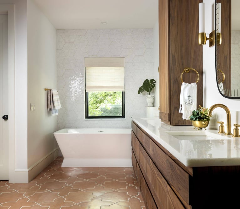 Contemporary bathroom with geometric tiles and a wall-mounted mirror, in home by Sardone | McClain in Dallas, Texas